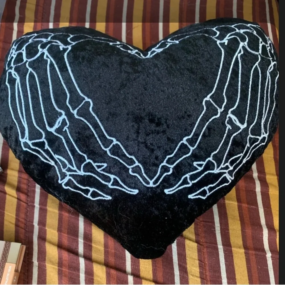 Black Heart Pillow with Skeleton Design